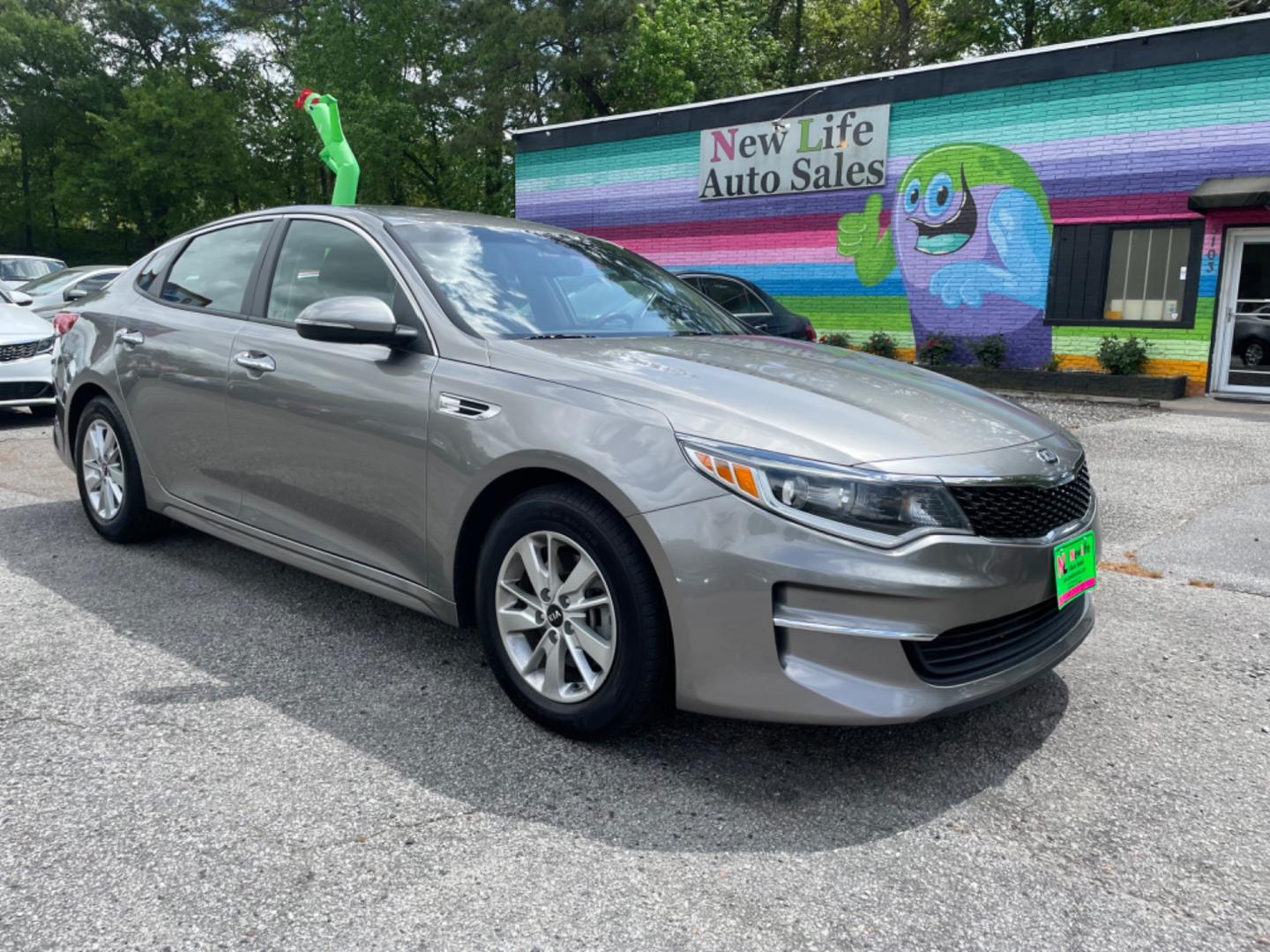 2018 GRAY KIA OPTIMA LX (5XXGT4L34JG) with an 2.4L engine, Automatic transmission, located at 5103 Dorchester Rd., Charleston, SC, 29418-5607, (843) 767-1122, 36.245171, -115.228050 - Roomy Interior with AUX/USB/Sat/Bluetooth, Power Windows, Power Locks, Power Mirrors, Backup Camera, Keyless Entry, Alloy Wheels. 118k miles Located at New Life Auto Sales! 2023 WINNER for Post & Courier's Charleston's Choice Pre-owned Car Dealer AND 2018-2024 Top 5 Finalist for Charleston City Pap - Photo#0